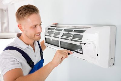 Important-Considerations-for-AC-Installation-and-Update – Copy HVAC technician cleaning and repairing a ductless mini split AC in San Tan Valley, AZ